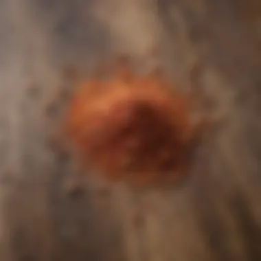 Cayenne Pepper Flakes Close-up of cayenne pepper flakes on a wooden surface