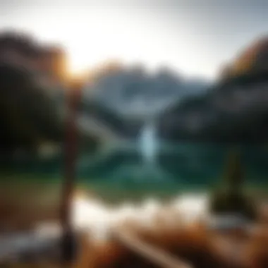 Tranquil Lake Fed by Waterfall Panoramic view of a tranquil lake fed by a waterfall, with mountains in the background