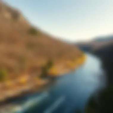 Nature's Serenity by the River A peaceful river flowing alongside a scenic drive