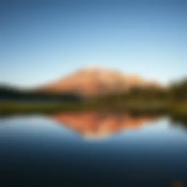 Peaceful Reflection in an Alpine Lake A tranquil alpine lake reflecting the mountain