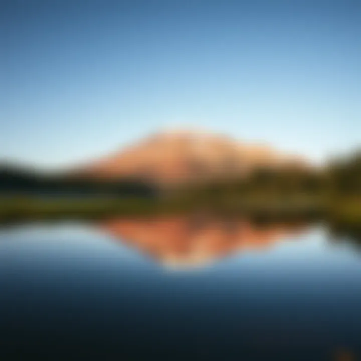 Peaceful Reflection in an Alpine Lake A tranquil alpine lake reflecting the mountain