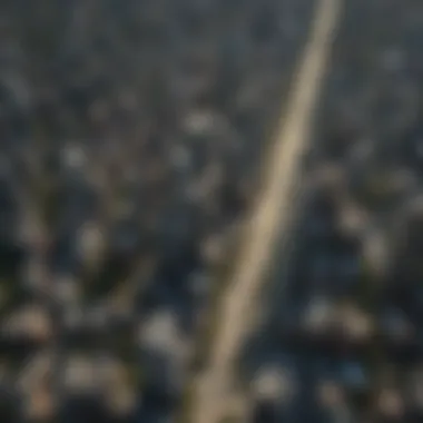 Aerial view of a densely populated urban area showcasing high-rise buildings and traffic congestion.