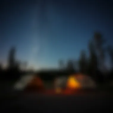 Rustic Campsite Under the Stars A rustic campsite with tents set up under a starry sky